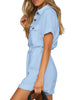 Side view of model wearing light blue short sleeves button-down belted romper
