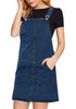 Angled shot of model wearing dark blue side pockets overall denim pinafore dress