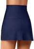 Back view of model in navy high-waist tulip hem ruched swim skirt
