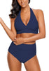 Model poses wearing navy halter ruched high-waist bikini set